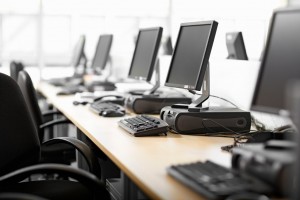 A desk with computers representing computer hacking law knowledge available through the Law Offices of Jerod Gunsberg in Los Angeles, CA