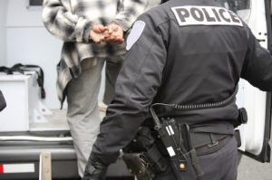 A person getting arrested symbolizing the law attorneys at the Law Offices of Jerod Gunsberg in Los Angeles, CA