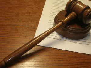 A gavel and paperwork symbolizing the law knowledge at the Law Offices of Jerod Gunsberg in Los Angeles, CA