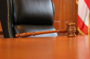 A gavel on a desk symbolizing the legal services of the Law Offices of Jerod Gunsberg in Los Angeles, CA